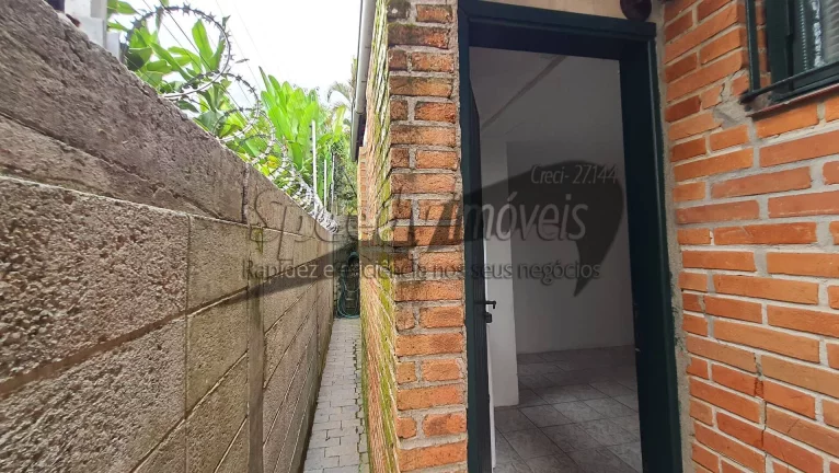 Imagem Sobrado 4 dormitórios no Guarujá, bairro Jardim Vigínia