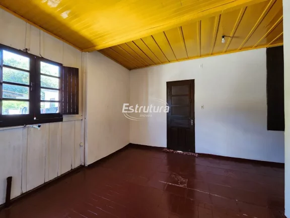 Terreno para venda com duas casas mistas