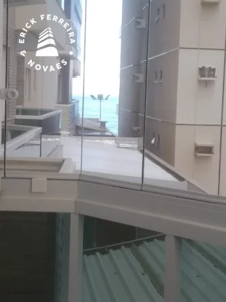 Imagem Prédio de frente para o mar 3 quartos sendo uma suíte mais dependencia de empregada duas vagas de garagem