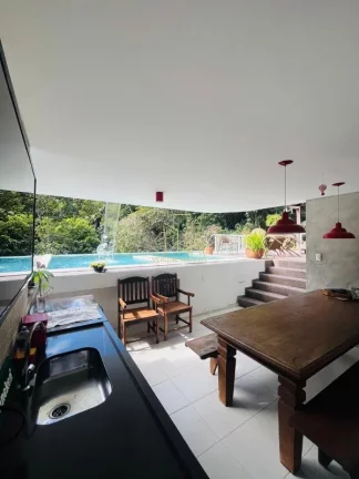 Imagem Casa Alto Padrão à Venda em Alphaville Salvador I | 600m² Privativos | 4 Suítes | Energia Solar | Espaço Gourmet