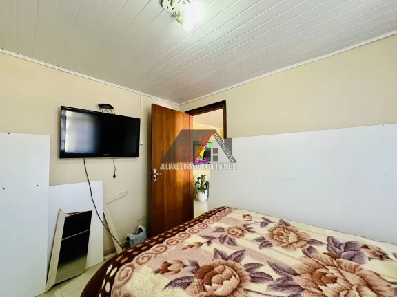 Imagem Terreno à venda com 02 casas no Bairro Thomaz Coelho em Araucária/PR.