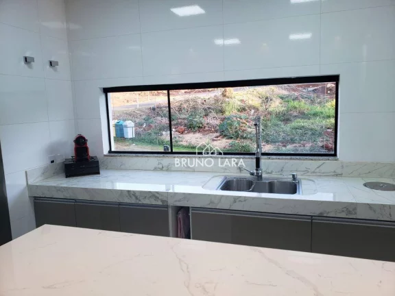 Imagem Casa à venda em Mário Campos Condomínio Serra dos Bandeirantes.