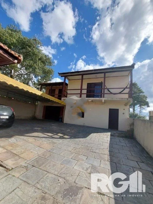 Imagem Linda Residência com cinco dormitórios no centro da cidade de Viamão/RS