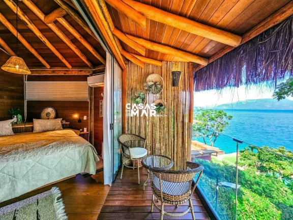 Imagem Casa de Luxo à Beira Mar em Angra dos Reis: 6 Suítes, 7 Salas, 950m² - Piscina, Churrasqueira e Deck Privativo