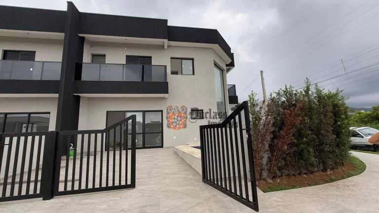 Foto do imóvel Sobrado com 4 suítes à venda, 121 m² por R$ 1.200.000 - Morada da Praia - Bertioga/SP