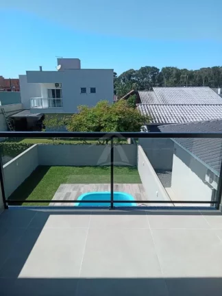 Imagem SOBRADO COM PISCINA, 3 QUARTOS SENDO SUÍTE, BARRA DO SAÍ