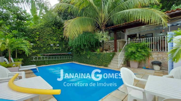 Foto do imóvel Casa sofisticada com 4 quartos, 3 suítes, jardins e área de lazer