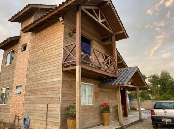 Imagem Casa à venda em Imbituba-SC, Alto Arroio: 4 quartos, 1 suíte, piscina e 150m² - Imperdível!
