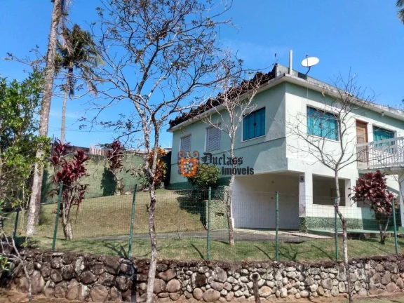 Foto do imóvel Casa com 2 dormitórios à venda, 113 m² por R$ 650.000 - Massaguaçu - Caraguatatuba/SP