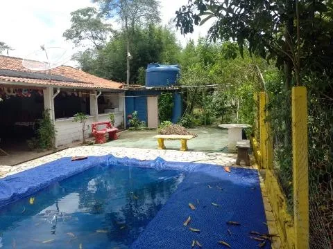 Imagem VENDA CHACARA CONDOMINIO SANTA ISABEL Excelente oportunidade!Com A/T 580m² e A/C 120m² distribuídos em 2 dormitórios sendo 1 suíte, sala.CONSULTE-NOS.