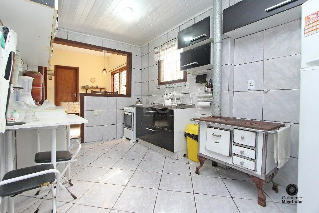 Imagem Casa para Venda - 150m², 2 dormitórios, 2 vagas - Nonoai