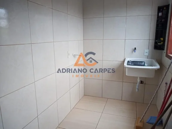 Imagem Casa com 2 dormitórios localizada no bairro Porto escalvados, em Navegantes - Adriano Carpes Imóveis Vende