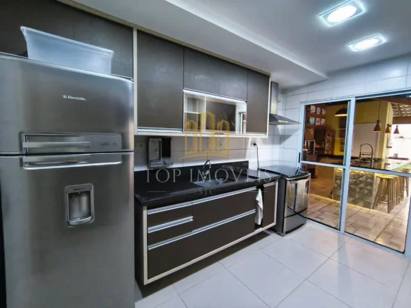 Imagem Maravilhosa casa três dormitórios suíte espaço gourmet em condominio fechado
