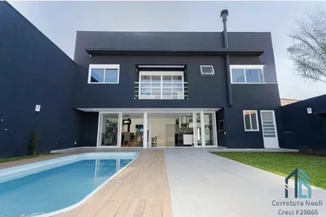 Imagem Casa PERMUTA 100%, 03 suítes, Piscina aquecida, no Uberaba em Curitiba PR