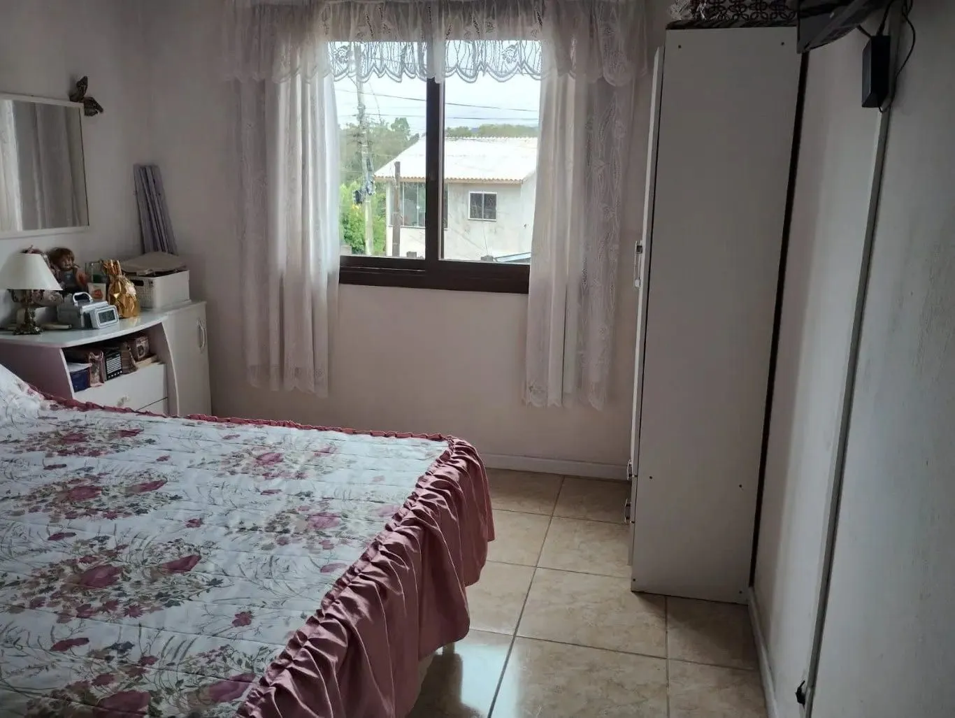 Imagem Casa de 3 dormitórios e 111m² à venda em Jardim Botânico, Porto Alegre.