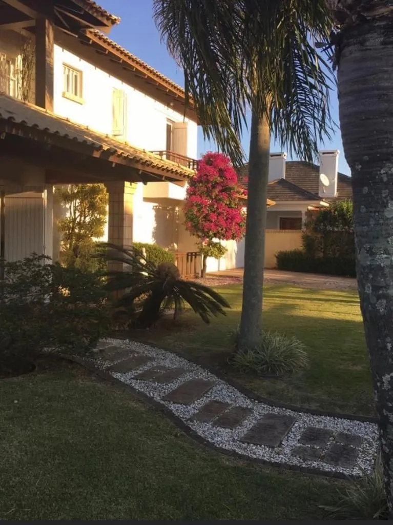 Imagem Casa na praia de Atlântida de 4 dormitórios
