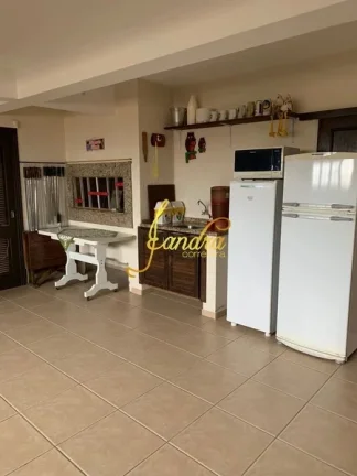 Imagem Sobrado com 7 dormitórios sendo 5 suítes e piscina, pertinho do mar