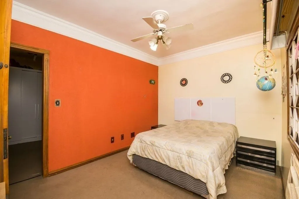 Imagem Excelente casa de 354m² com 5 dormitórios e 8 vagas.