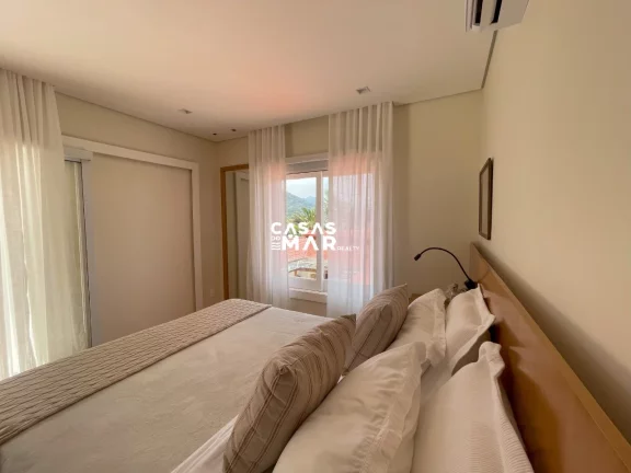 Imagem Casa de Luxo à Beira-Mar em Condomínio na Vila Velha, Angra dos Reis-RJ: 6 Quartos, 6 Suítes, 7 Salas e 7 Banheiros.