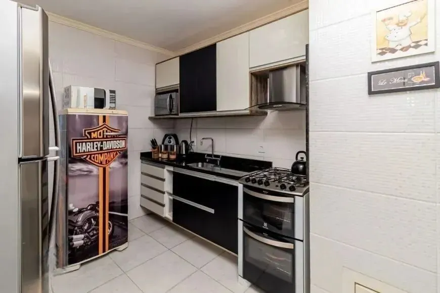 Imagem Casa com 214m², localizado no bairro Vila Jardim em Porto Alegre/RS.