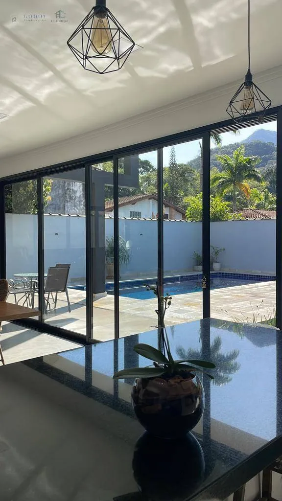 Imagem Casa moderna e sofisticada em condomínio fechado - 4 suítes | Área gourmet