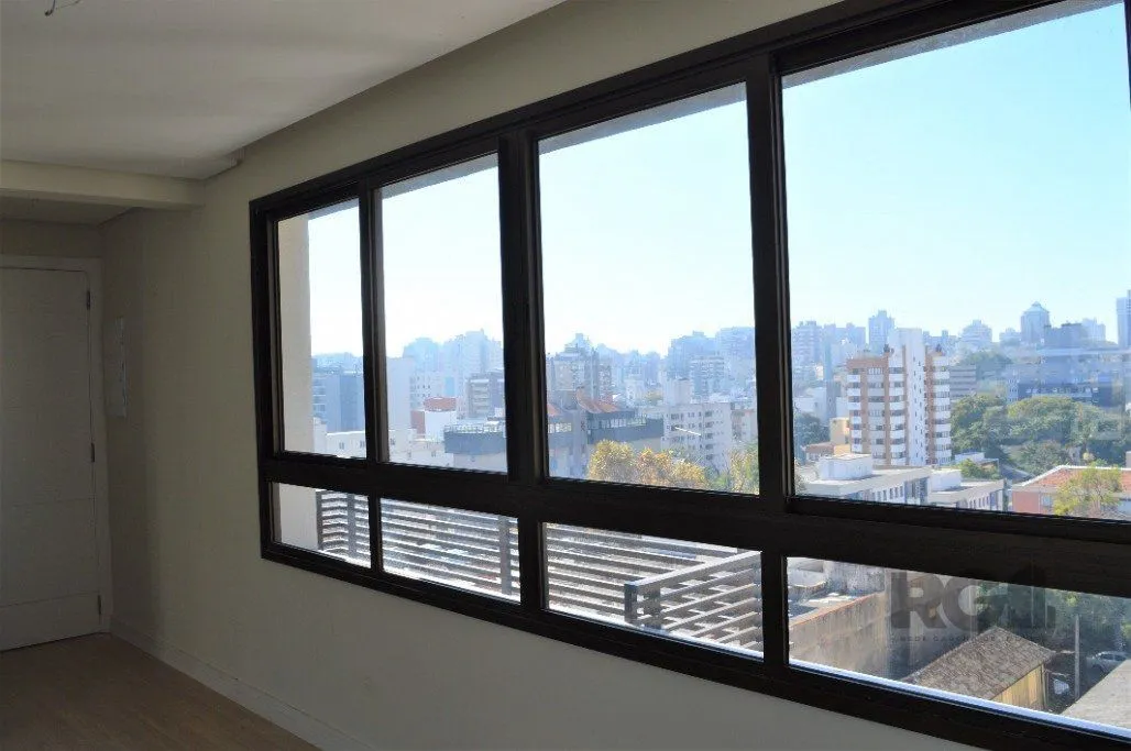 Imagem Lindo apartamento 2 dormitórios com 2 suítes, lavabo, vaga de garagem, amplo living 2 ambientes e cozinha com churrasqueira.