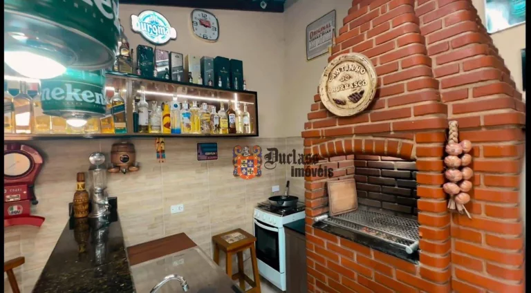 Imagem Sobrado com 4 dormitórios à venda, 246 m² por R$ 1.000.000,00 - Jardim Aruan - Caraguatatuba/SP