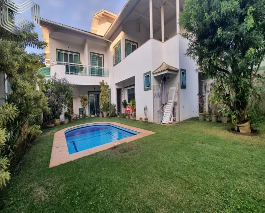 Imagem Casa em Condomínio de Alto Padrão no Recreio dos Bandeirantes, RJ: 3 suítes, 4 vagas, 558m² de luxo! Pfoximo a Praia