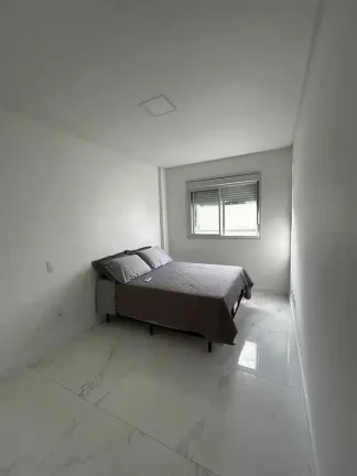Apartamento com 2 dormitórios sendo 1 suíte e 1 vaga de garagem em Governador Celso Ramos/SC