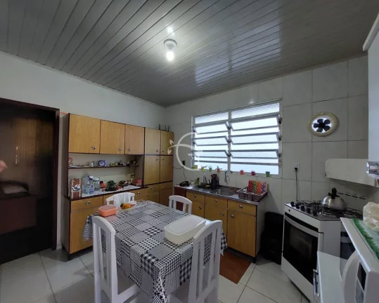 Imagem CASA NO BAIRRO GLÓRIA COM TERRENO MEDINDO 625 M² SENDO 12,5M FRENTE X 50M PROFUNDIDADE