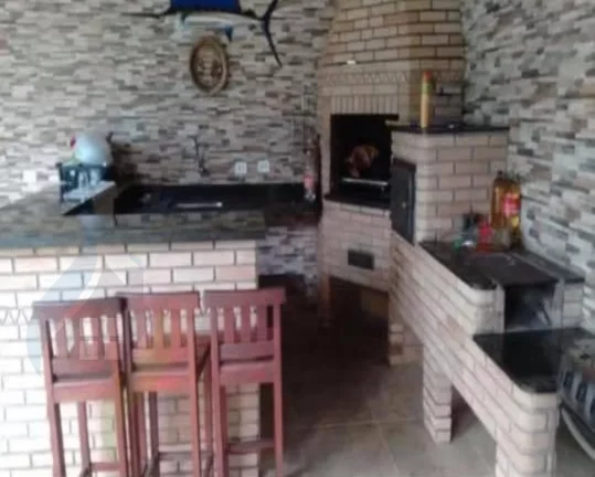 Imagem Casa de 7 dormitórios, 4 suíte, 6 banheiros e 2 vagas, com 327,695m² construída e 1.047,75m² total em Centervalle, Bertioga