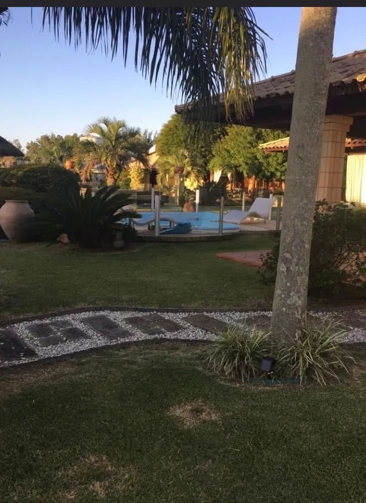 Imagem Casa na praia de Atlântida de 4 dormitórios
