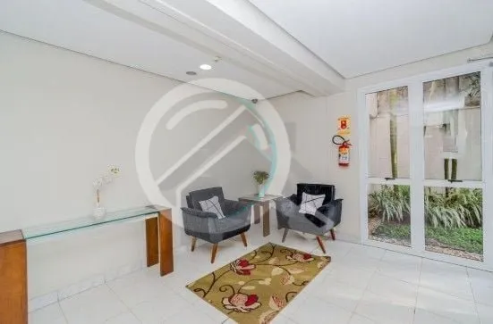 Imagem Apartamento com 57m², dois dormitórios sendo uma suíte, living, cozinha tipo americana, área de ...