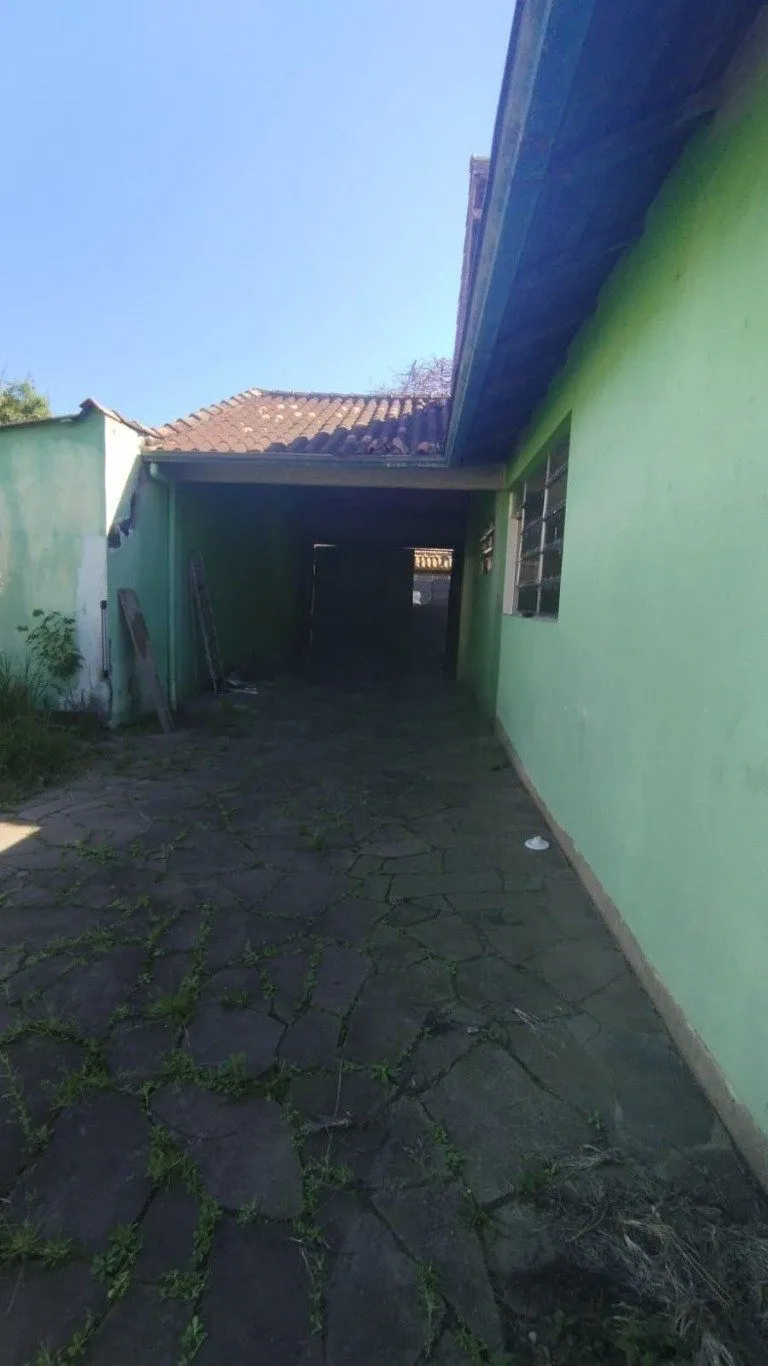 Imagem Casa com 4 quartos e 257m² à venda em Guarujá, Porto Alegre.