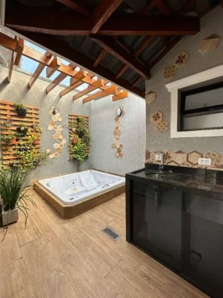 Imagem Casa com 3 dormitórios à venda, 115 m² por R$ 830.000,00 - Caiçara - Praia Grande/SP