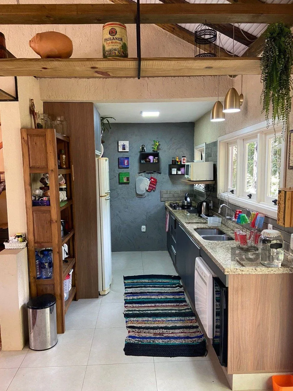 Imagem Casa com 2 suítes, lareira, deck, vaga de garagem - 140m² no bairro Laje de Pedra, Canela/RS