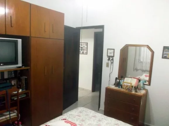 Imagem CASA COM 4 DORMITORIOS (1 SUITES)