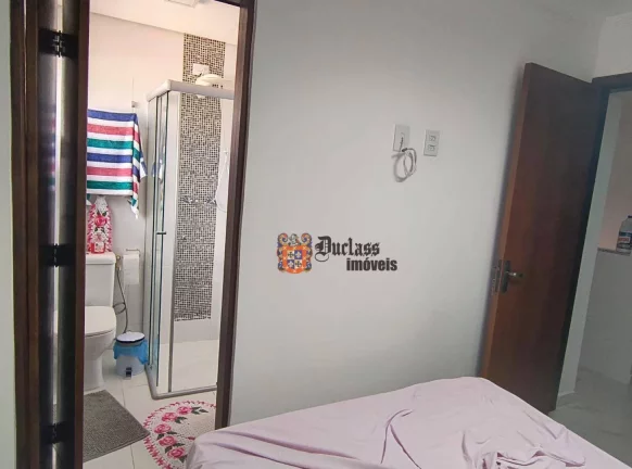 Imagem Sobrado com 2 dormitórios à venda, 92 m² por R$ 530.000,00 - Martim de Sá - Caraguatatuba/SP