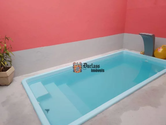 Imagem Casa com 2 dormitórios à venda, 72 m² por R$ 435.000 - Nova Mirim - Praia Grande/SP