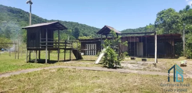 Imagem Sítio plana, 24.200 mil m², lagoa c/ peixes, área gourmet, fibra ótica, em ITAJAÍ SC