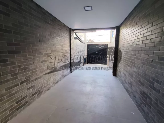 Imagem Casa para venda em Santos, sobreposta alta no Embaré