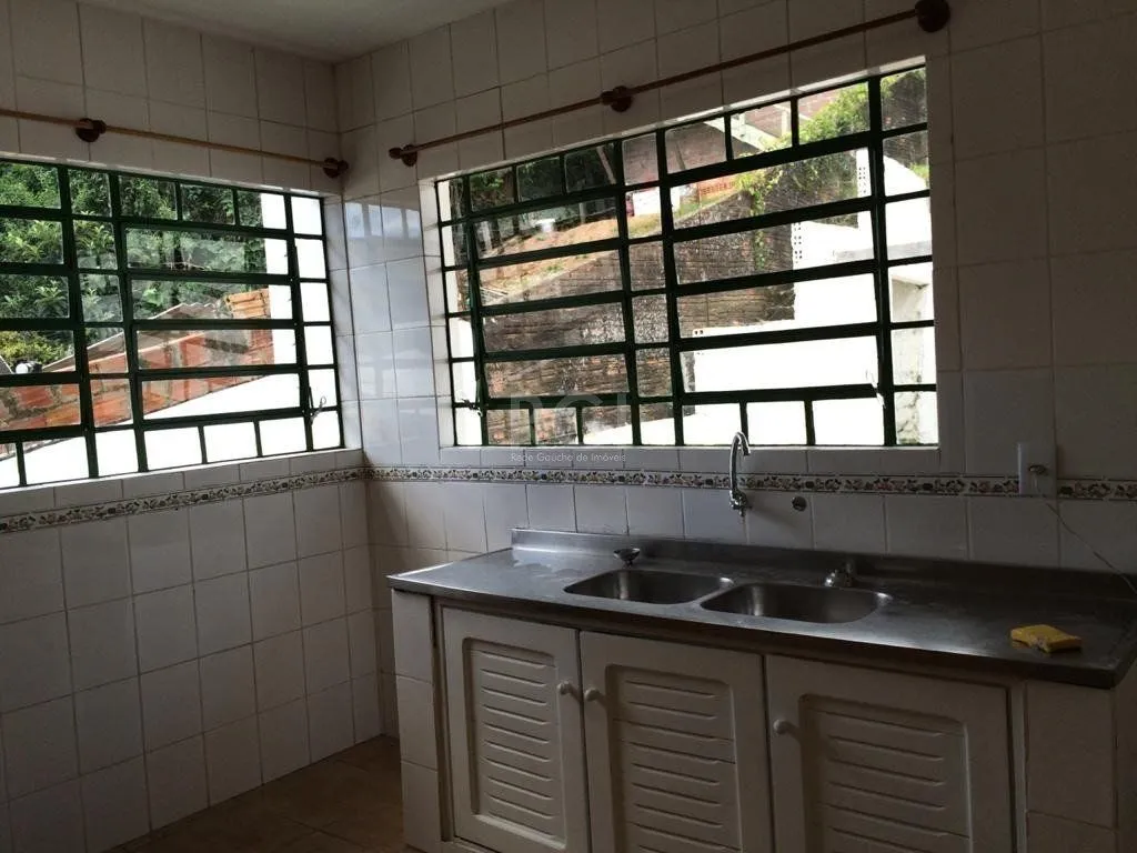 Imagem Casa para Venda - 124m², 3 dormitórios, 2 vagas - Glória