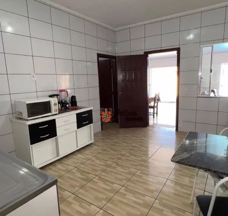 Imagem Casa com 2 dormitórios à venda, 100 m² por R$ 590.000,00 - Nova Mirim - Praia Grande/SP