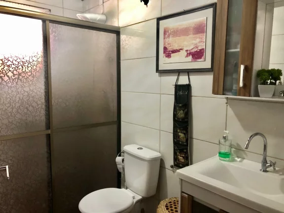 Imagem Oportunidade única: Casa dos sonhos em Garopaba com edícula e jardim exuberante!