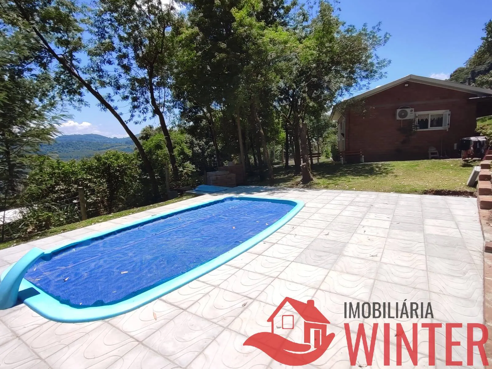 Foto do imóvel Sítio de 1,2 hectares com casa e piscina em São Roque, Feliz.