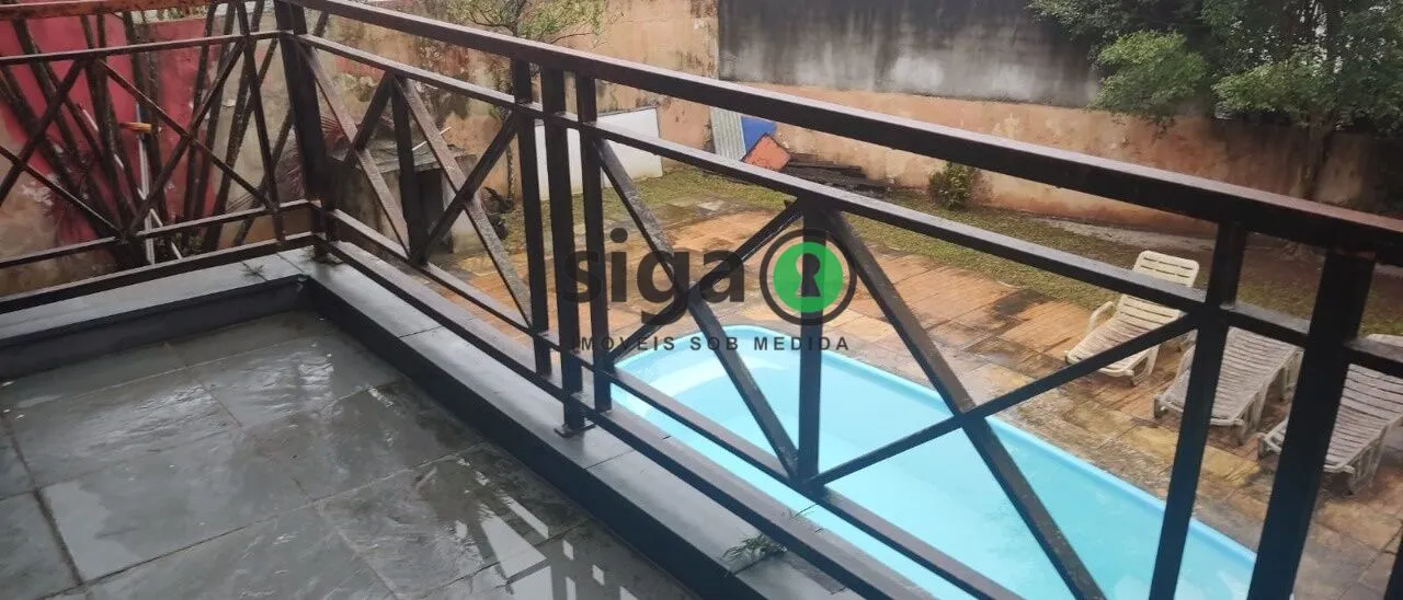 Foto do imóvel Sobrado de alto padrão com 500m², 4 suítes e ampla área verde