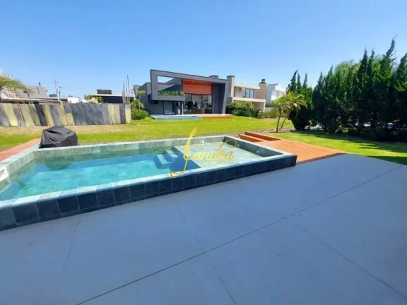 Imagem Sobrado beira de lago com 05 suítes piscina mobiliado e decorado