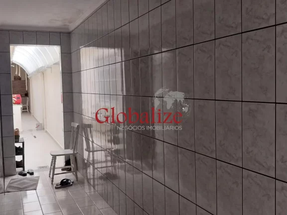 Imagem Casa térrea à venda com 125m², 2 quartos, churrasqueira, área coberta, vaga de garagem coberta por R$390.000,00 em Santos