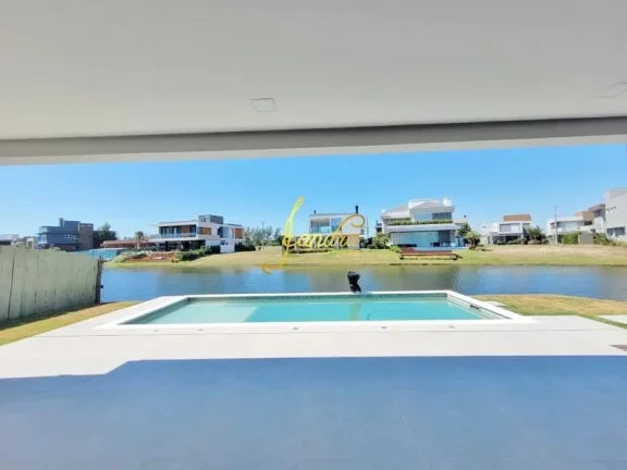 Imagem Sobrado beira de lago com 05 suítes, elevador, semi mobiliado