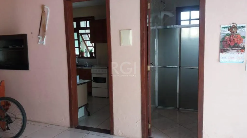 Imagem Casa com 3 dormitórios à venda, 230,11 m² por R$ 900.000,00 - Igara III - Canoas/RS